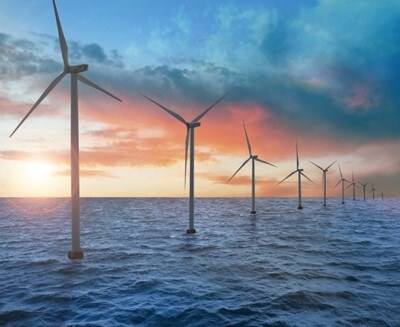 wind turbines at sunset